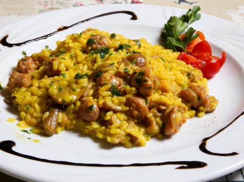 risotto allo zafferano con porcini e salsiccia